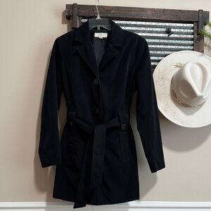 Woman’s Elegant Black Trench Coat with Belt